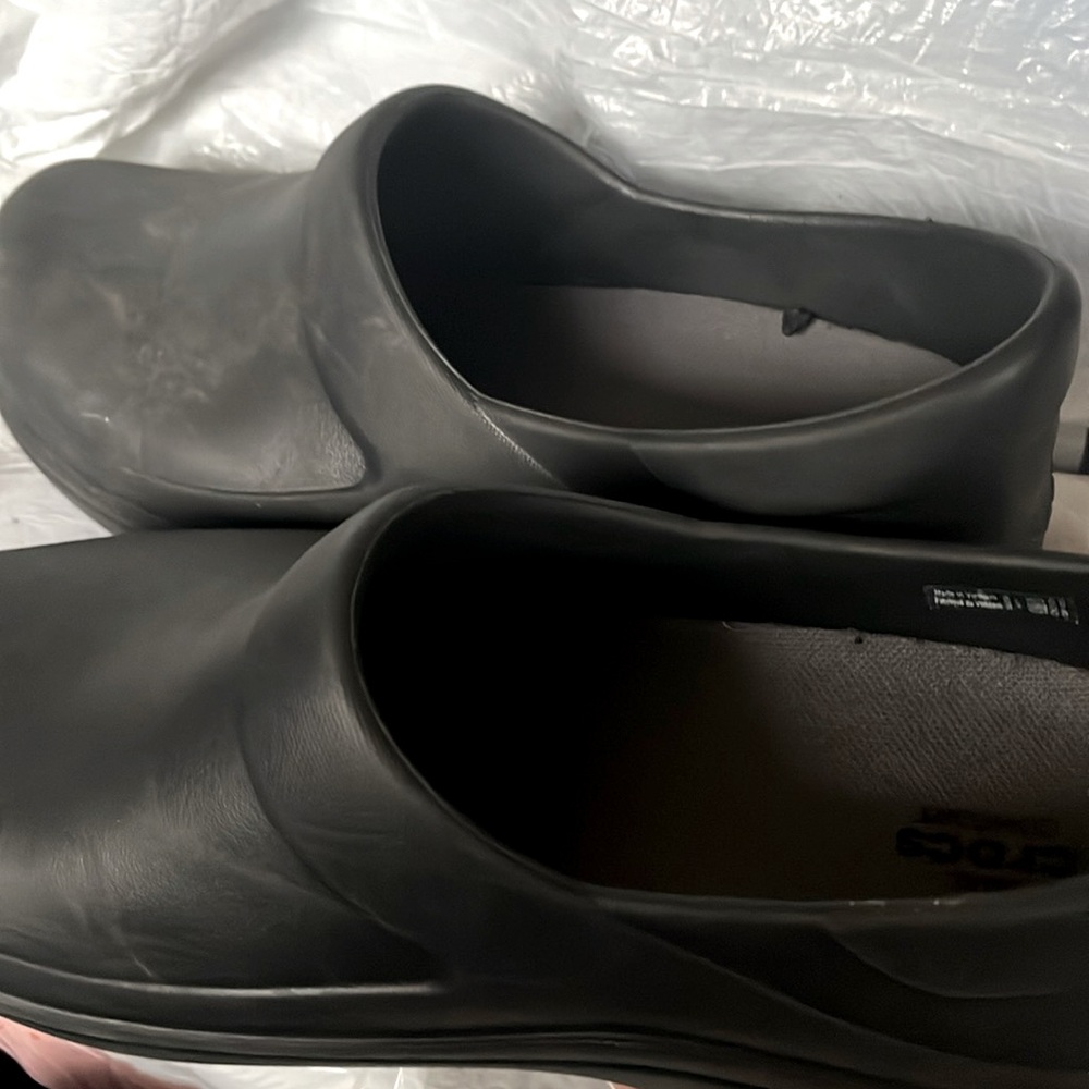 Crocs on the Clock, size 11. Dual comfort slip resistant technology